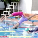 Students-swimming-in-school-pool